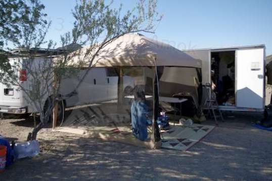 Van + cargo trailer + extra crap = pretty nice little camp!