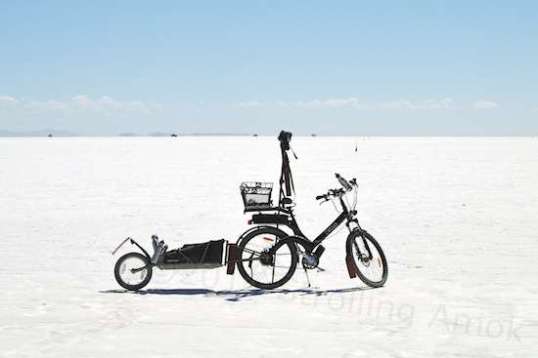 Yup, the Official Strolling Amok Videography Vehicle on the salt of Bonneville. As long as the salt is dry, the added fenders and flaps work quite well. Not perfect, but plenty good enough. 
